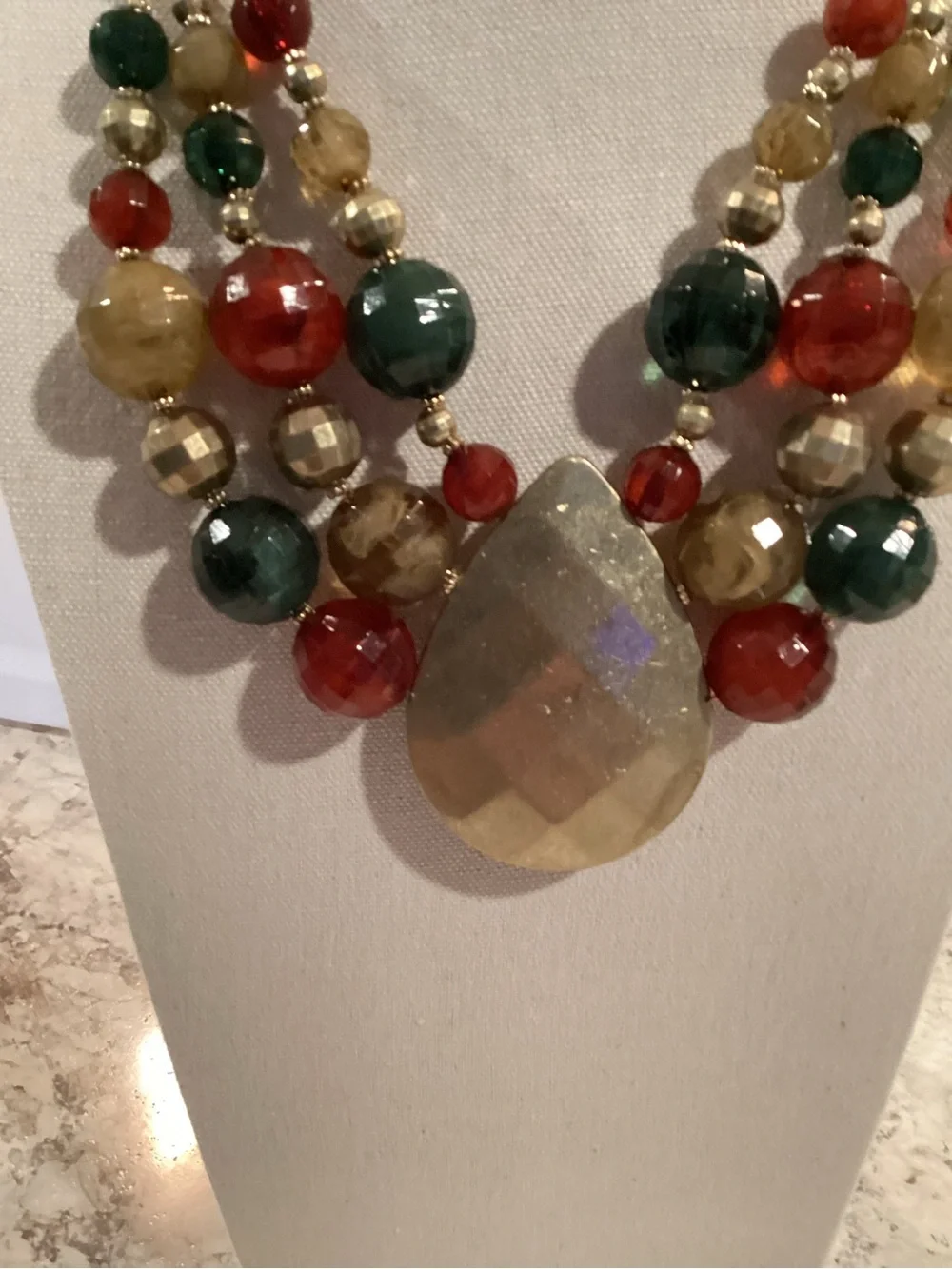 Multi-Strand Faceted Acrylic Drop Necklace in Red, Green & Gold